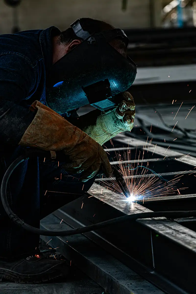 Welder working on fabrication